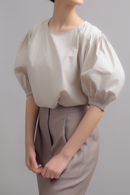 Koraalkleurige katoenen blouse met volumemouwen